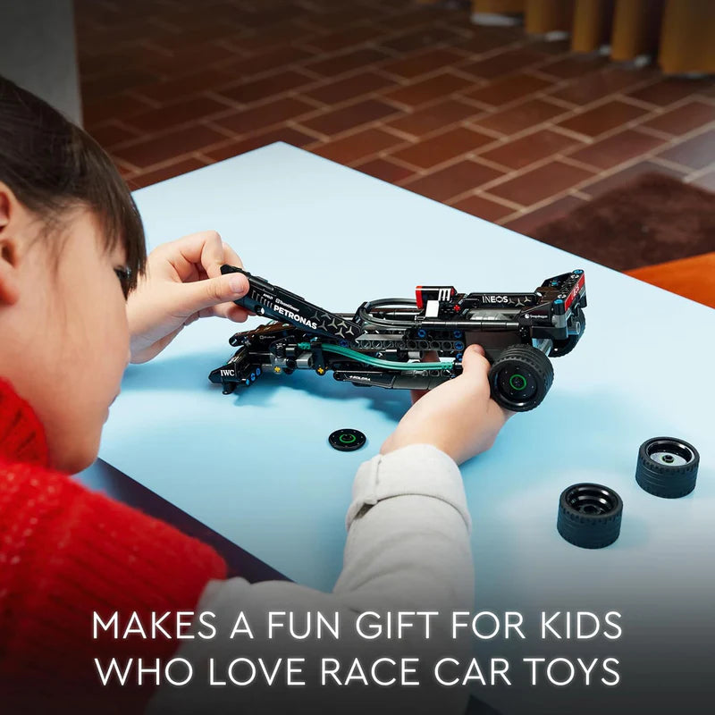 Race car toy with pull-back action
